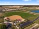 Aerial view showcasing the baseball field, and a well maintained parking lot at 6376 Sw 97Th Terrace Rd, Ocala, FL 34481