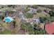 A community featuring a pool, community center, tennis courts, basketball courts and multiple parking lots at 660 Silver Pass, Ocala, FL 34472