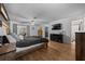 Comfortable bedroom features a wood bedframe, a TV and access to a patio at 660 Silver Pass, Ocala, FL 34472