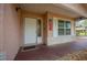 Close-up of the front door with charming details and a welcome mat, creating a warm invitation at 660 Silver Pass, Ocala, FL 34472