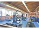 Spacious gym with a wooden ceiling and exercise equipment at 660 Silver Pass, Ocala, FL 34472