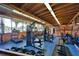 Spacious gym with a wooden ceiling and exercise equipment at 660 Silver Pass, Ocala, FL 34472