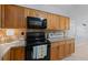 Modern kitchen with sleek appliances, stylish backsplash, and ample counter space at 660 Silver Pass, Ocala, FL 34472