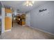 Spacious kitchen with a ceiling fan and tile flooring and dining area at 660 Silver Pass, Ocala, FL 34472