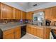 Cozy kitchen featuring under cabinet lights, stainless steel appliances and tiled floors at 660 Silver Pass, Ocala, FL 34472