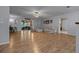 Spacious living room featuring hardwood floors, ample natural light, and modern decor at 660 Silver Pass, Ocala, FL 34472