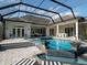 Stunning pool area with a spa and fountains and a view of the home at 7585 Nw 33Rd Pl, Ocala, FL 34482