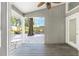 Relaxing covered back porch with wood decking and a view of the backyard at 8 Banyan Dr, Ocala, FL 34472