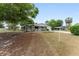 This is a charming single-story home with a well-maintained front yard at 9940 Sw 103Rd Pl, Ocala, FL 34481