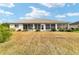 A view of the lawn and landscaping around the home at 5245 Nw 21St Loop, Ocala, FL 34482