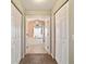 Bright main bathroom with a tub, shower, and dual closets with decorative trim at 5245 Nw 21St Loop, Ocala, FL 34482
