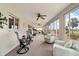 Enclosed sunroom filled with lots of seating, lots of windows, and lovely views at 5245 Nw 21St Loop, Ocala, FL 34482