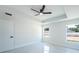 This bedroom has recessed ceiling, fan and dual windows providing natural light at 112 Juniper Run, Ocala, FL 34472