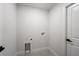 A tidy laundry area features modern fixtures and ample space at 112 Juniper Run, Ocala, FL 34472