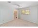 Bedroom with neutral carpet with walk-in closet at 1179 Se 170Th Ct, Silver Springs, FL 34488