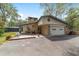 Charming single story home with a brick exterior, front courtyard, two car garage, and a screened pool area at 1179 Se 170Th Ct, Silver Springs, FL 34488