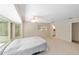 Spacious main bedroom with carpeted floors, ceiling fan, and lots of natural light at 1179 Se 170Th Ct, Silver Springs, FL 34488