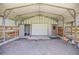 Interior of the barn with doors and storage space at 14171 Sw 8Th Ave, Ocala, FL 34473