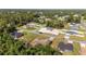 From above, a neighborhood shows houses with spacious lots, showcasing a Gathering-friendly community at 15087 Sw 43Rd Ct, Ocala, FL 34473