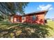 Home exterior with a covered porch and lawn at 15087 Sw 43Rd Ct, Ocala, FL 34473