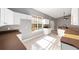 Bright kitchen features white cabinets, brown countertops, and natural light from a window at 15087 Sw 43Rd Ct, Ocala, FL 34473