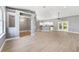 Spacious open-concept living area with abundant natural light and views of the kitchen at 15087 Sw 43Rd Ct, Ocala, FL 34473