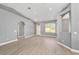 Spacious open-plan living room featuring plenty of natural light at 15087 Sw 43Rd Ct, Ocala, FL 34473