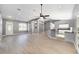 Open floor plan showcases a living area with bar access to the kitchen at 15087 Sw 43Rd Ct, Ocala, FL 34473