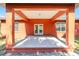 Covered porch with ample room for outdoor seating and relaxation at 15087 Sw 43Rd Ct, Ocala, FL 34473