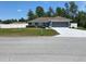 Inviting single-story home with a large front yard and a two-car garage at 15266 Sw 44Th Ter, Ocala, FL 34473