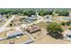 See a community with winding streets, manicured lawns, and an aerial view of solar panels on select homes at 173 Juniper Way, Ocala, FL 34480