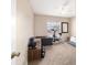 A functional bedroom space, with weights, exercise bike, and a neutral palette for versatile use at 173 Juniper Way, Ocala, FL 34480