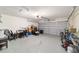 View of the spacious two car garage with abundant space for multiple purposes at 173 Juniper Way, Ocala, FL 34480