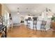 Open kitchen area with barstool seating and view to the living spaces at 173 Juniper Way, Ocala, FL 34480