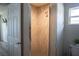 Bathroom showcasing glass enclosed tiled shower with tiled flooring and toilet at 18 Larch Radl, Ocala, FL 34480