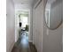 Hallway with a view of a home office and nearby closet at 18 Larch Radl, Ocala, FL 34480