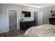 Main bedroom with ensuite bathroom and large dresser at 18 Larch Radl, Ocala, FL 34480