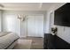 Main bedroom with a large closet and a mounted television at 18 Larch Radl, Ocala, FL 34480