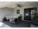 Inviting outdoor patio featuring comfortable seating, stylish decor, and ample space at 18 Larch Radl, Ocala, FL 34480