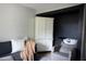 Salon room featuring a white cabinet, shampoo bowl, salon chair and sofa seating at 18 Larch Radl, Ocala, FL 34480