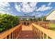 Wooden deck with covered seating area, perfect for outdoor dining at 2045 Se 32Nd St, Ocala, FL 34471