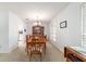Traditional dining room with wood furniture, chandelier, and natural light at 2045 Se 32Nd St, Ocala, FL 34471