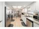 Modern kitchen with stainless steel appliances, granite countertops, and tile flooring at 2045 Se 32Nd St, Ocala, FL 34471