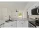 Kitchen showcases granite countertops, stainless appliances, and an open layout at 24375 Nw Foxglove Ln, Dunnellon, FL 34431