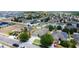 Wide aerial view of homes in a planned community, highlighting solar panels and manicured lawns at 4013 Ruby Run, Haines City, FL 33844