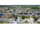 Expansive aerial view of a community filled with neatly arranged single-Gathering homes at 4013 Ruby Run, Haines City, FL 33844