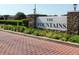 Community sign for The Fountains with brick accents and manicured landscaping at 4677 Nw 46Th Ave, Ocala, FL 34482