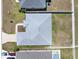 Aerial view of a well-maintained home, showing the roof, yard, pool, and surrounding neighborhood at 4806 Nw 8Th Ter, Ocala, FL 34475