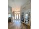Inviting entryway with hardwood floors, columns, neutral paint, and glass french doors at 4981 Ne 110Th Street Ne St, Anthony, FL 32617