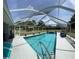 Inviting screened pool area with ample deck space, providing a relaxing backyard oasis at 4981 Ne 110Th Street Ne St, Anthony, FL 32617